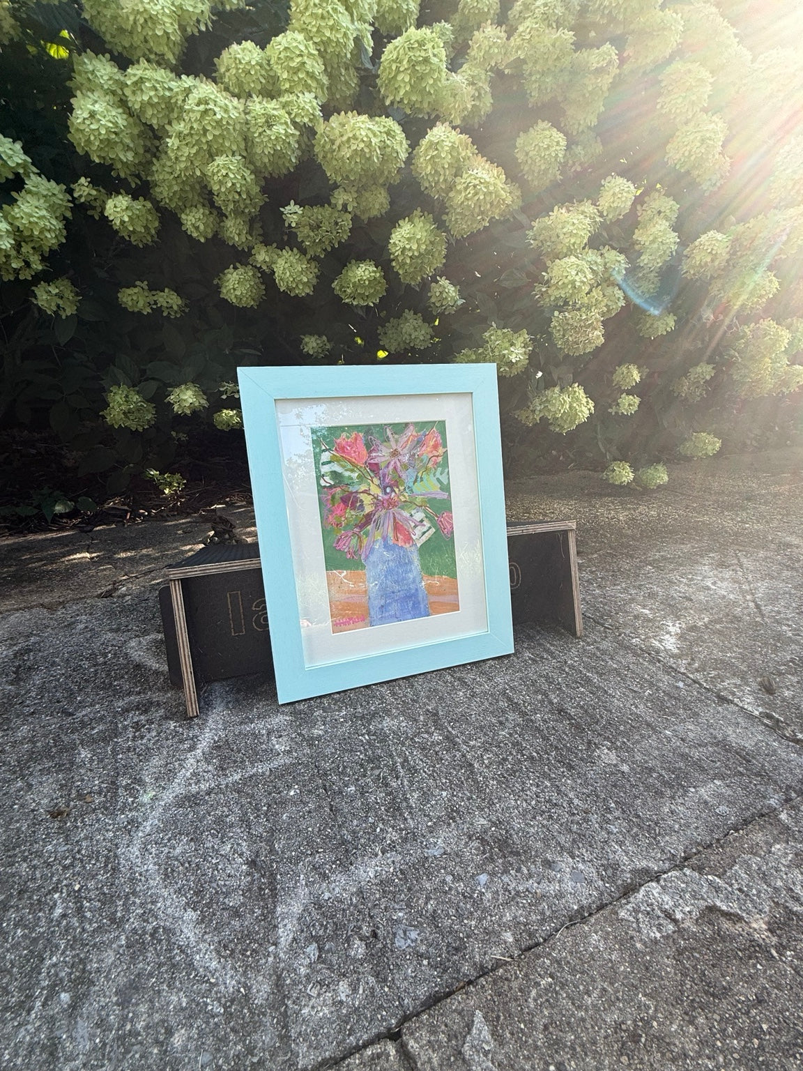 The Good Kind of Chaos framed original artwork outdoors